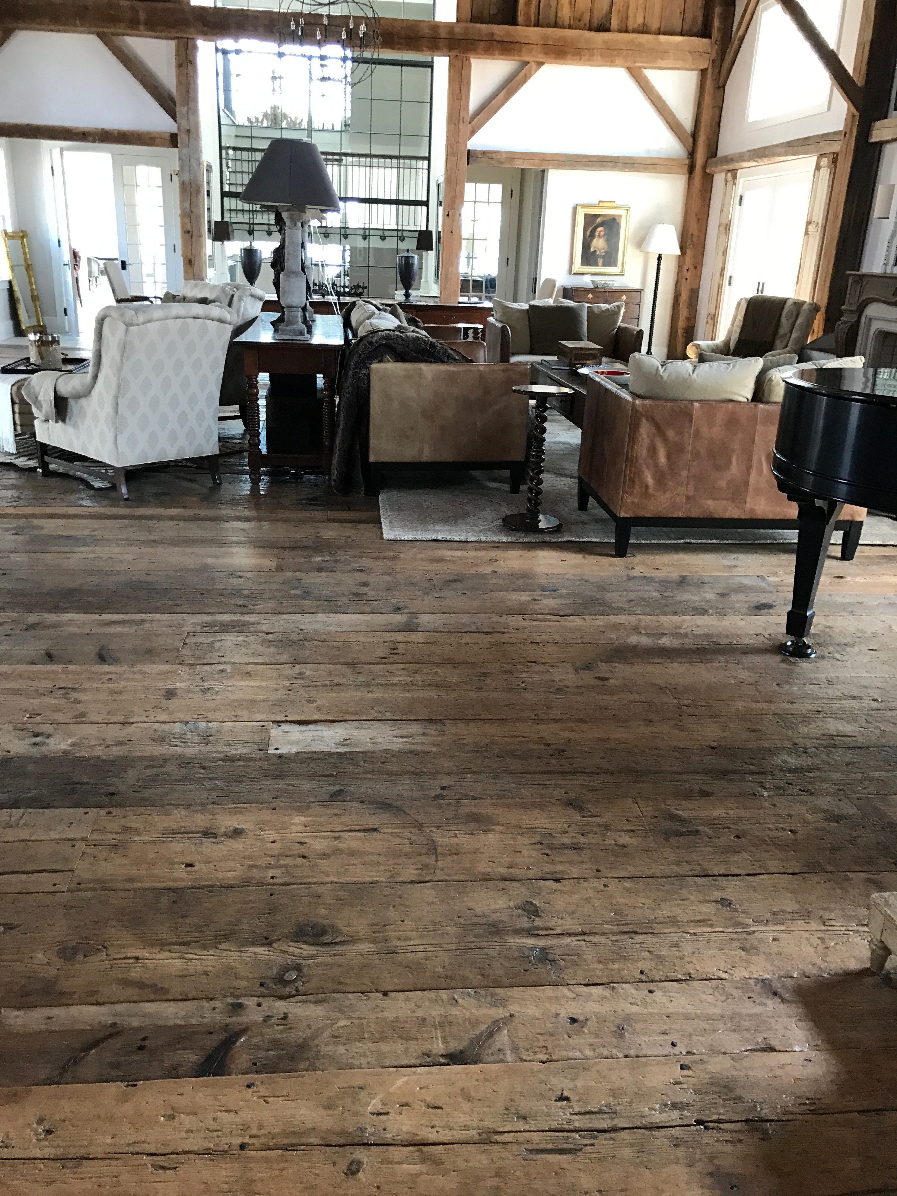 Wide plank reclaimed original surface flooring in a residence in Pemaquid, Maine, sourced by Rousseau Reclaimed Lumber & Flooring