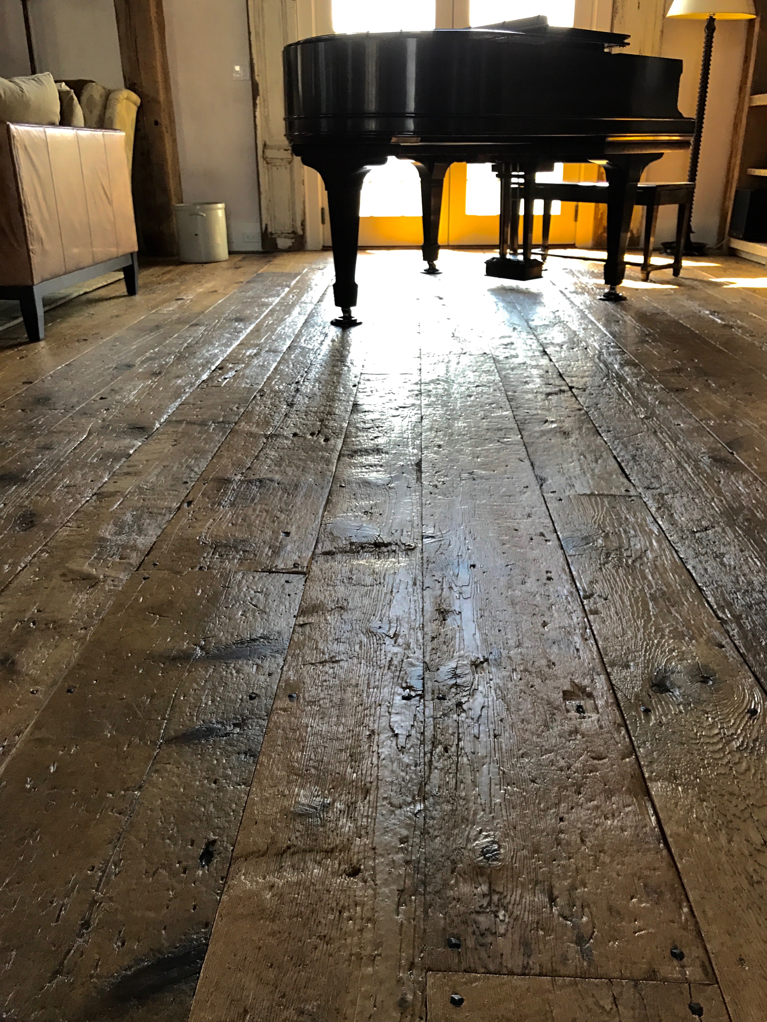 Reclaimed threshing pine floor in a converted barn residence in Pemaquid, Maine