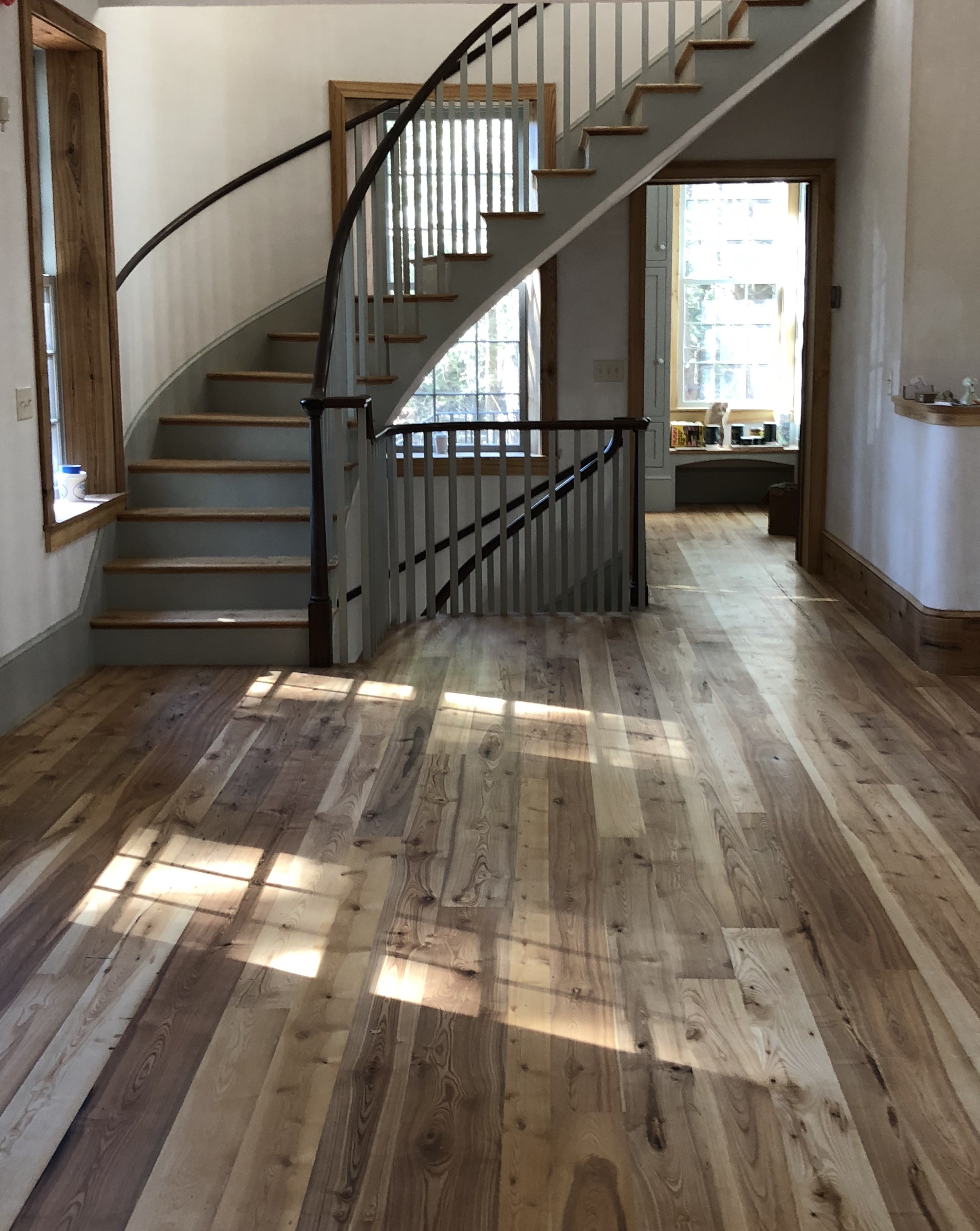 Residential flooring made from antique ash lumber in South Freeeport, Maine sourced by Rousseau Reclaimed Lumber & Flooring
