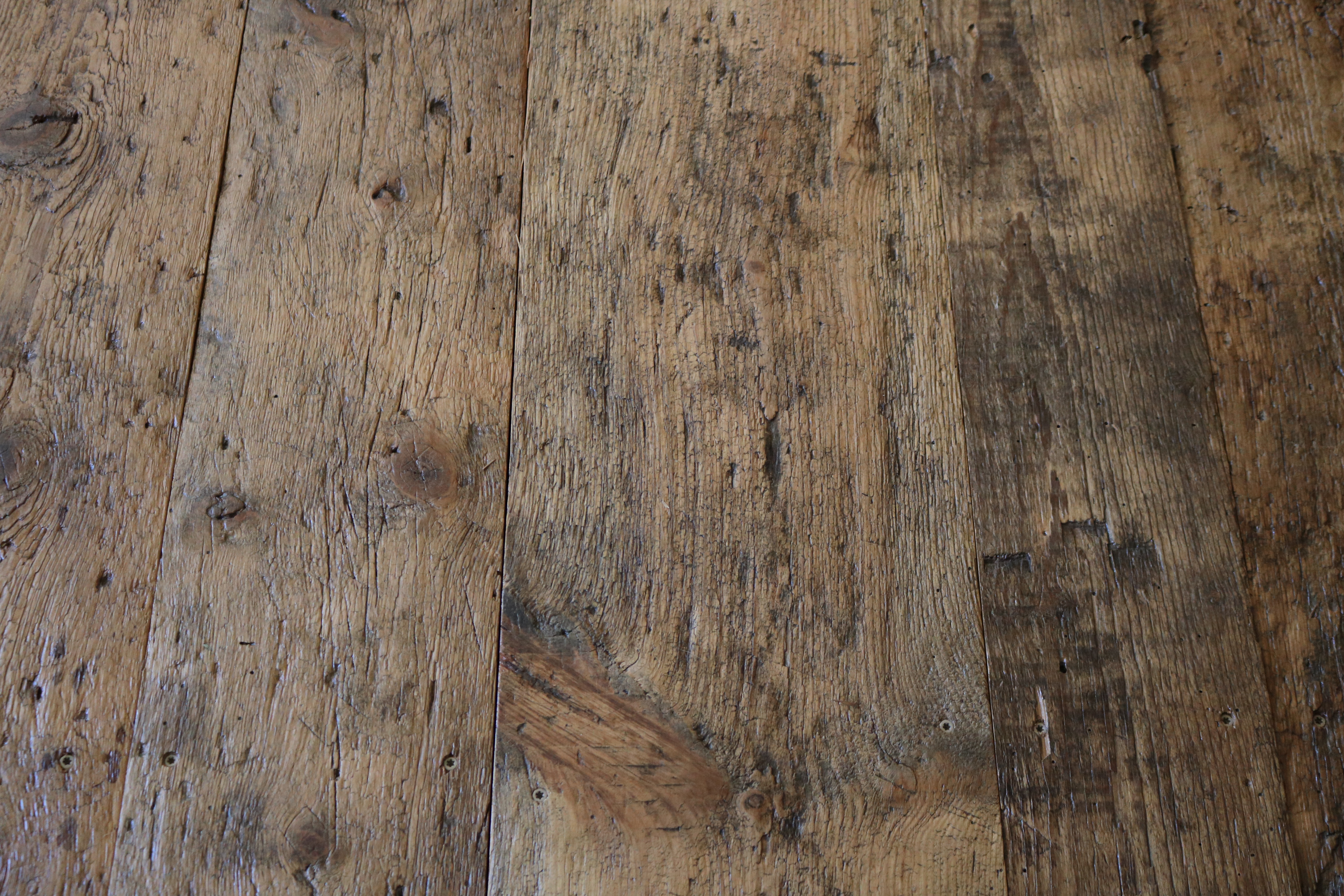 Detail of reclaimed barn board flooring in a residence in Yarmouth, Maine, sourced by Rousseau Reclaimed Lumber & Flooring